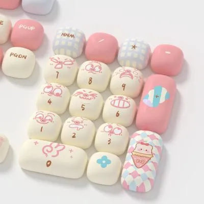 Pig theme keyboard keycap set showing cartoon designs on mechanical keyboard keys