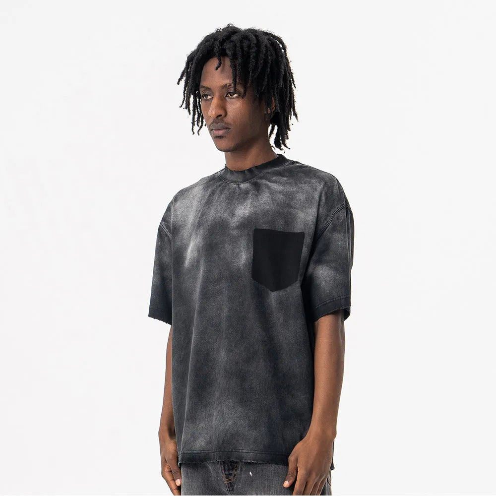 Black men's cotton t-shirt with printed letter design and loose drop-shoulder sleeves.
