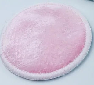 Velvet makeup remover pad in water pink and light blue colours showing bamboo polyester blend texture