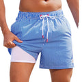 Men's loose-fit floral swimming trunks in quick-dry spandex fabric on a blue background.