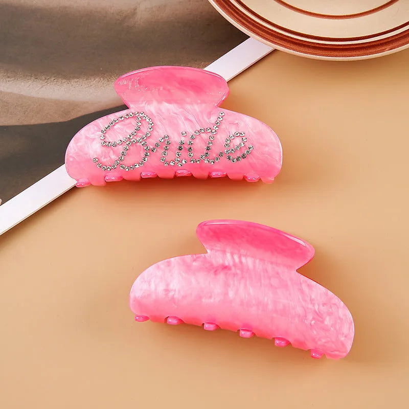 Pink and white acrylic hair clip with spot drill pattern and double-sided decoration