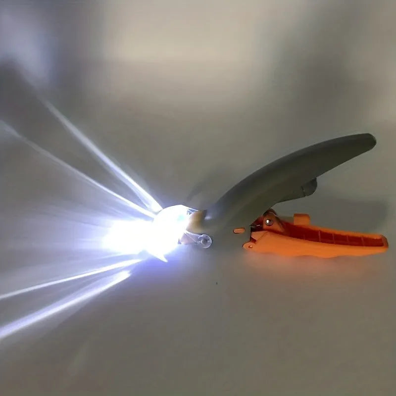 Yellow LED pet nail trimmer with magnifying glass, for trimming cat and dog nails safely.