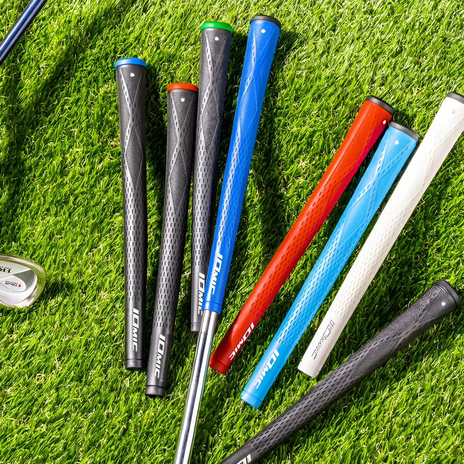 TPE golf club grip replacement in various colours including pink, red, blue, white, and two-tone black with coloured head.
