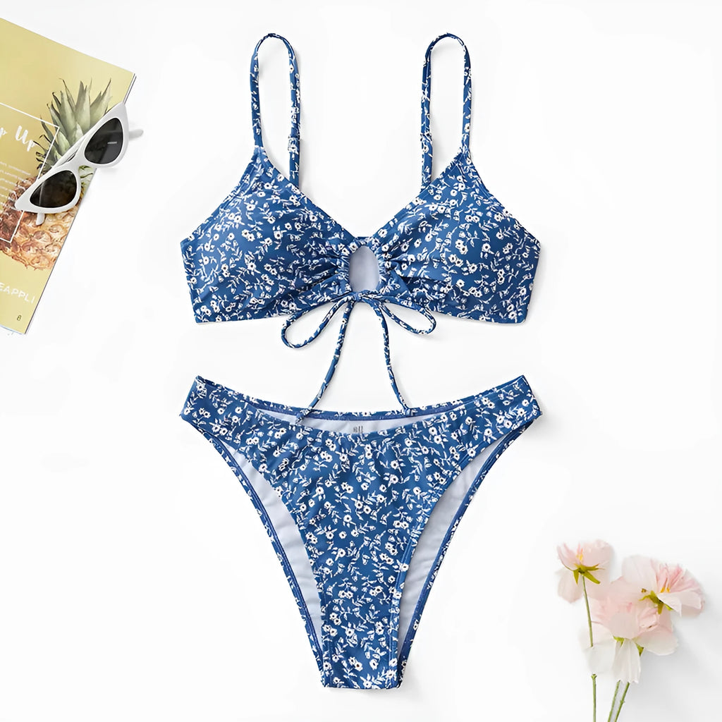 Blue polyester swimsuit three-piece set without steel rings showing separate top and shorts components