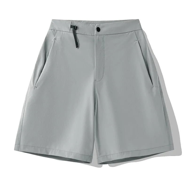 Men's solid colour quick-drying sports shorts with a 3D elastic cut for running and climbing.