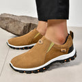 Men's gray round toe slip-on casual shoes with a rubber sole on a plain background.