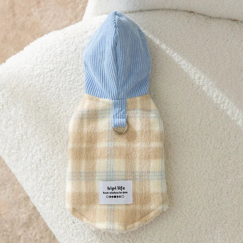 Blue corduroy chessboard grid hooded vest for dog on model showing hooded traction design