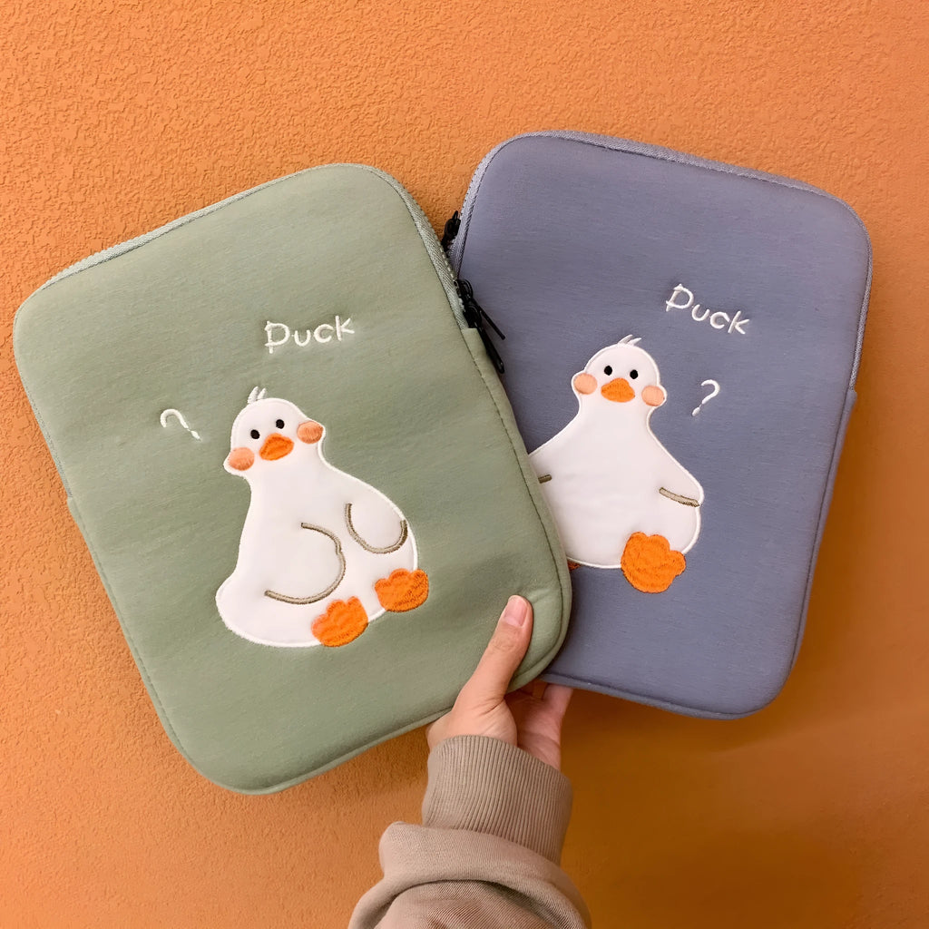 Blue cotton tablet case with duck embroidery design and zipper closure for 11-inch to 16-inch tablets