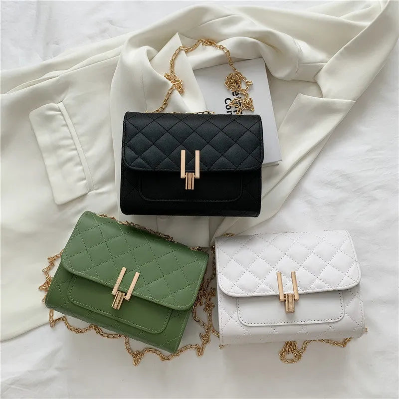 Women's diamond lattice chain crossbody bag in minimalist solid colour design with adjustable strap