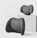 Black memory cotton car headrest and back cushion set on a car seat.