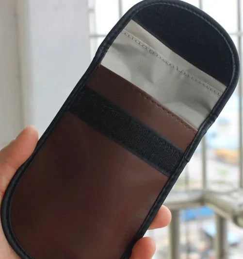 Black microfiber Faraday cage bag measuring 13.5x9.5 cm for blocking car key and RFID signals