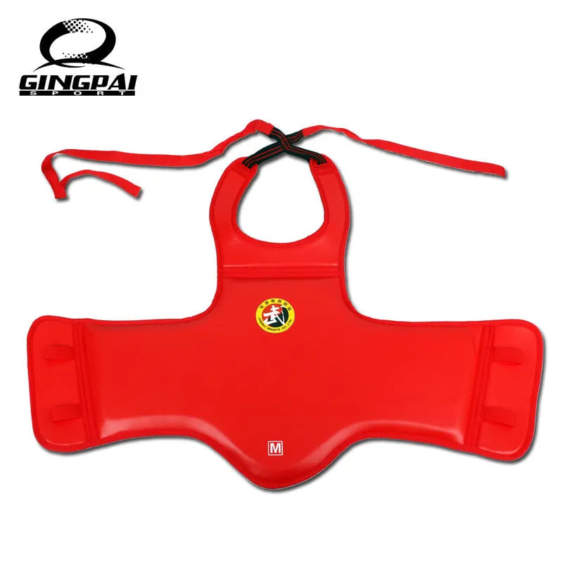 Red boxing helmet and matching one-piece chest protector on a sports background.