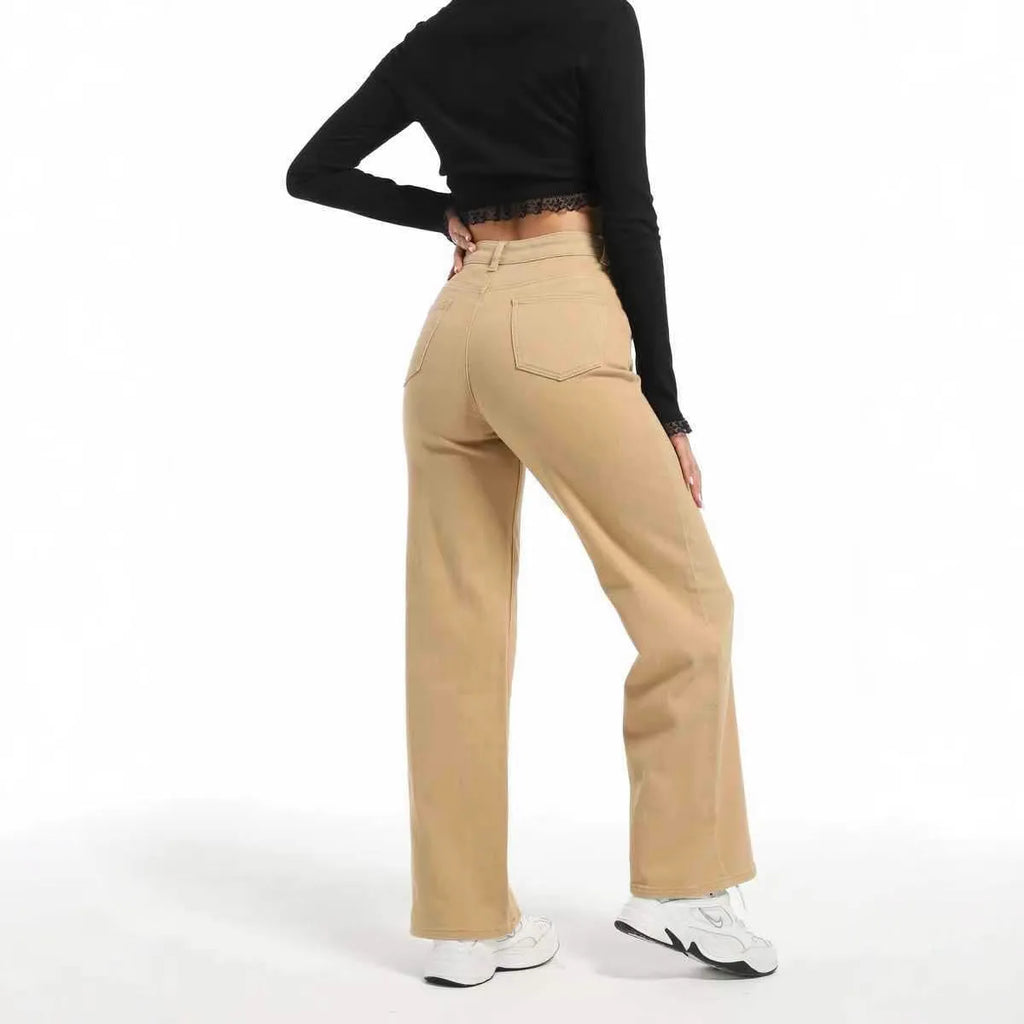 Women's high-waisted wide-leg straight jeans in apricot colour on a hanger