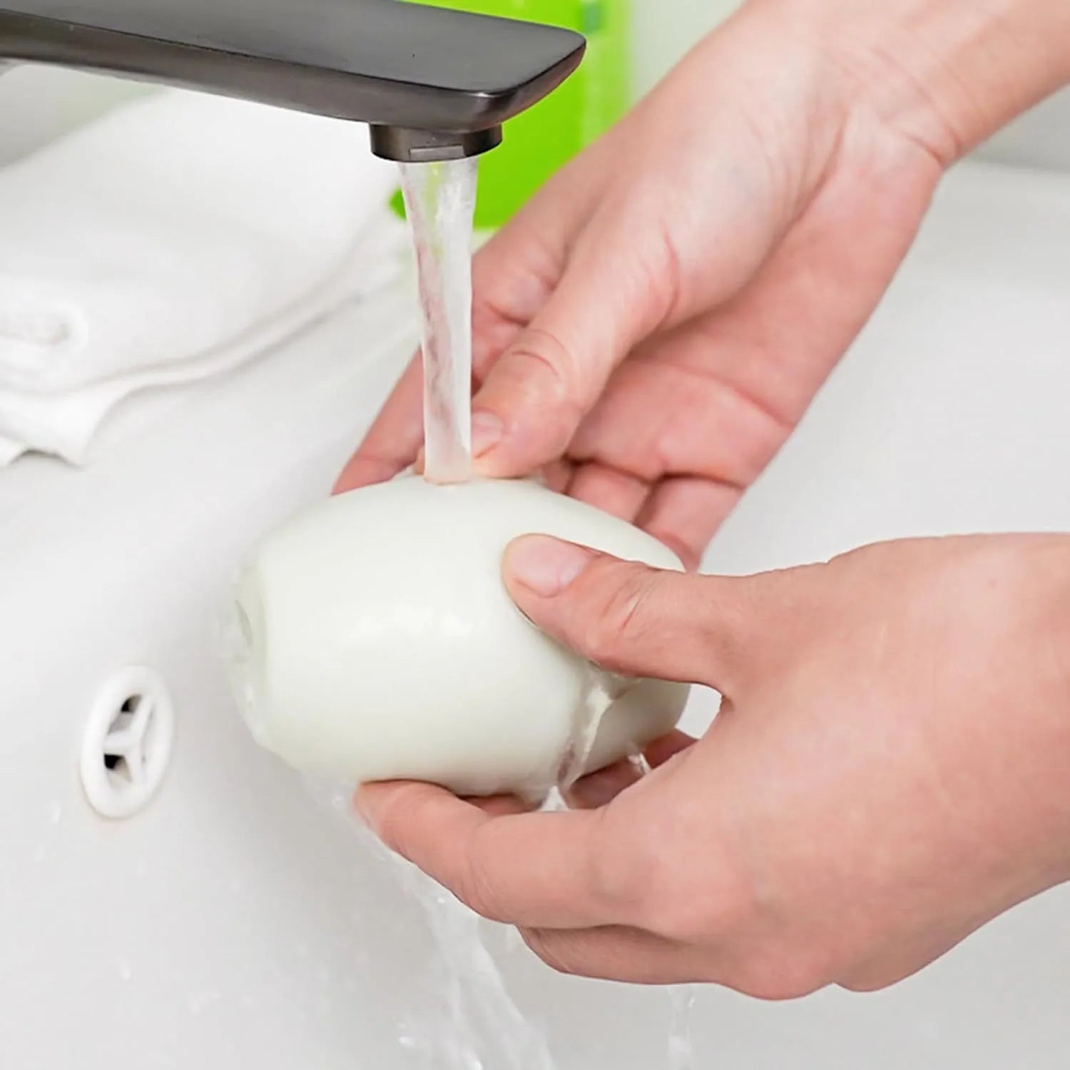 Green and white washable reusable gel lint roller ball for pet hair removal