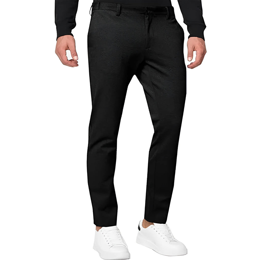 Men's slim-fit tapered chino trousers in a cotton blend fabric shown in a solid colour.
