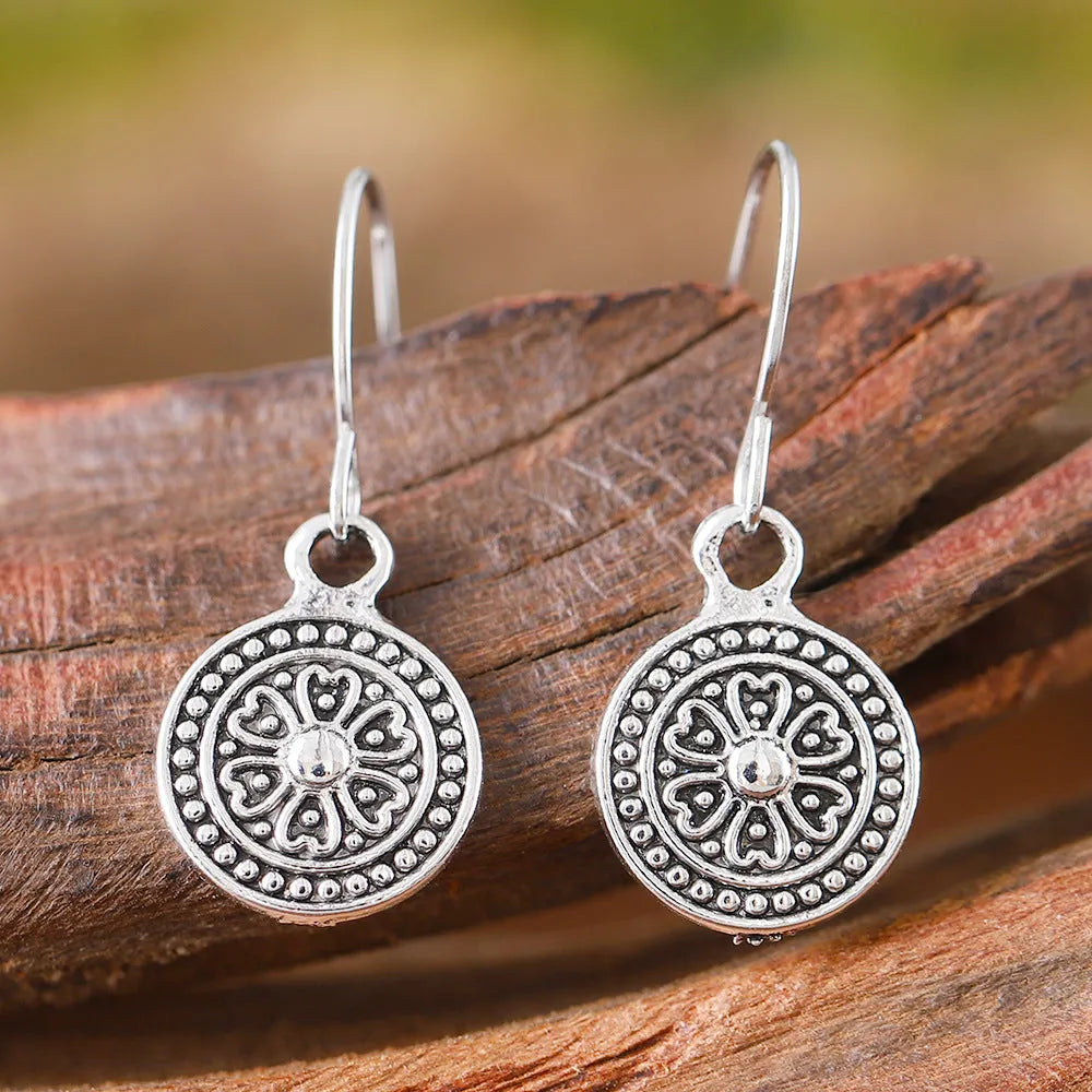 Bohemian retro distressed ethnic earrings with geometric round shape in zinc alloy