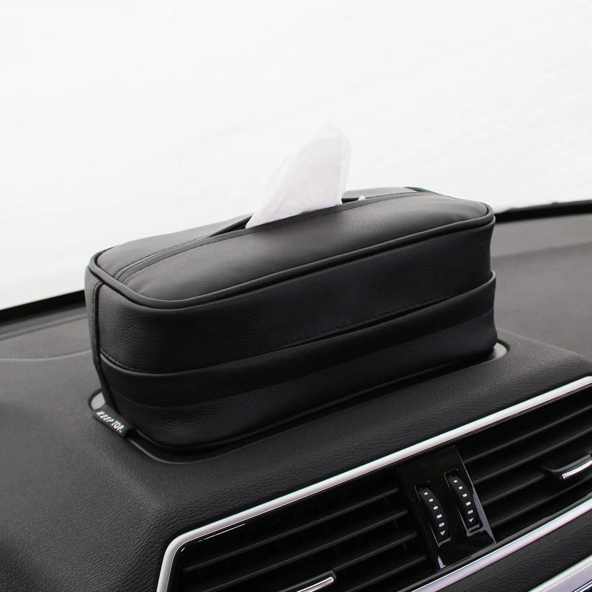 Black PU leather car hanging storage box with zipper and hook, shown next to a measuring tape indicating 23cm length.
