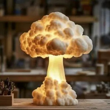 Modern art atomic bomb explosion mushroom cloud shaped table lamp on a desk.