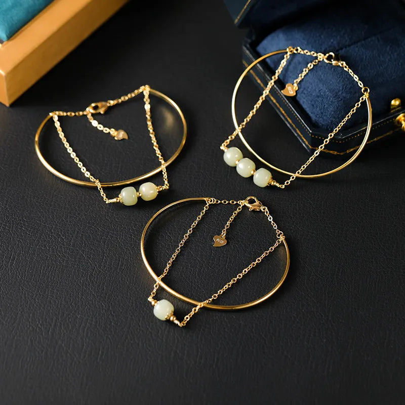 Jade lucky beads bracelet for women with gold inlay detailing showing single, double and three beads versions