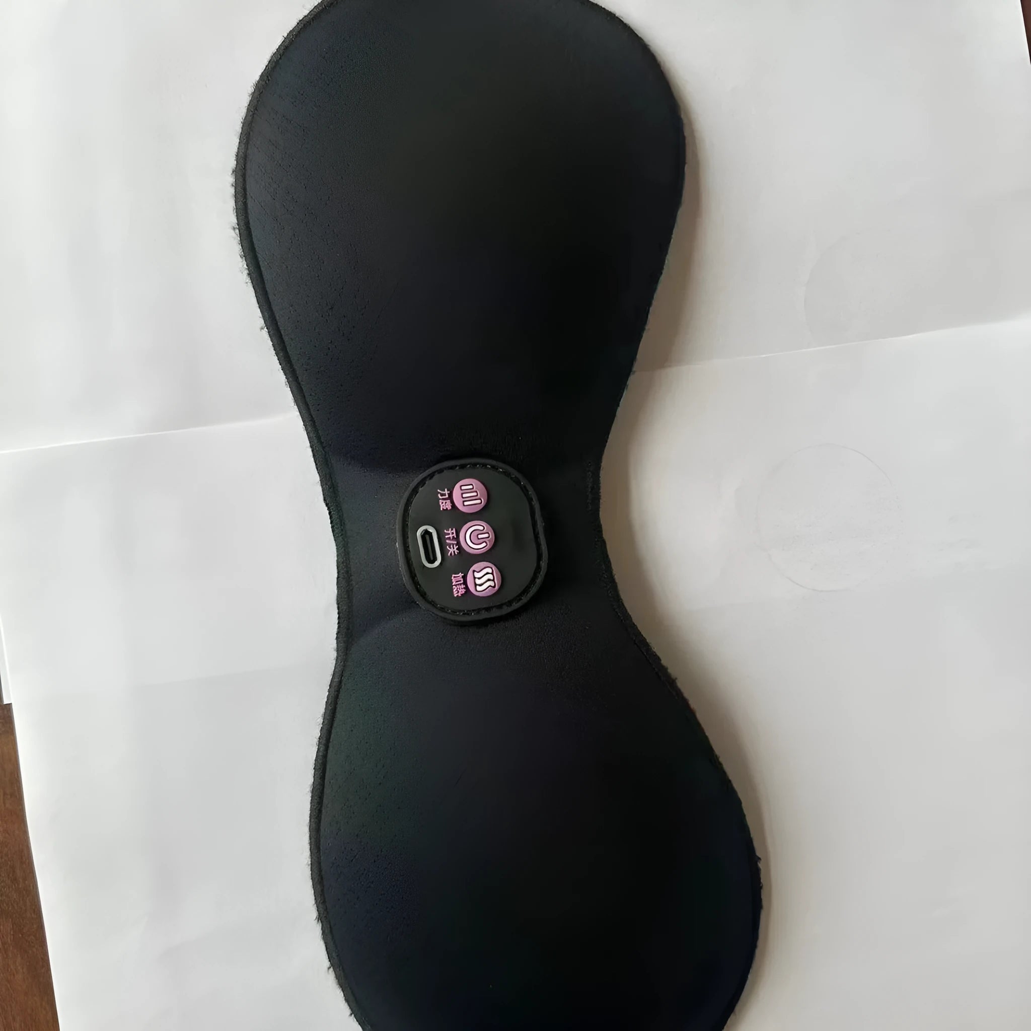 Black electric massage chest paste with adhesive stickers and 3-key English interface for vibration massage