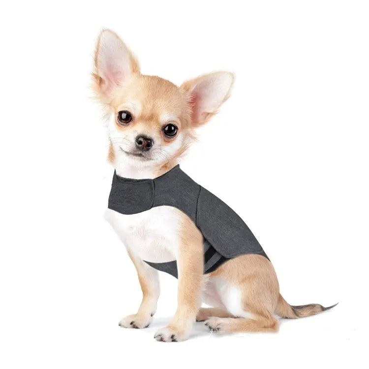 Heather grey dog anxiety jacket vest on a size chart showing seven options from XXS to XXL.