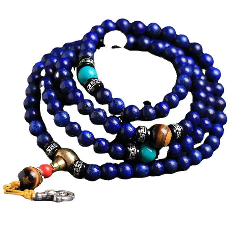 Natural Lapis Lazuli 108 bead bracelet in 8mm size on unisex wrist showing deep blue stone beads