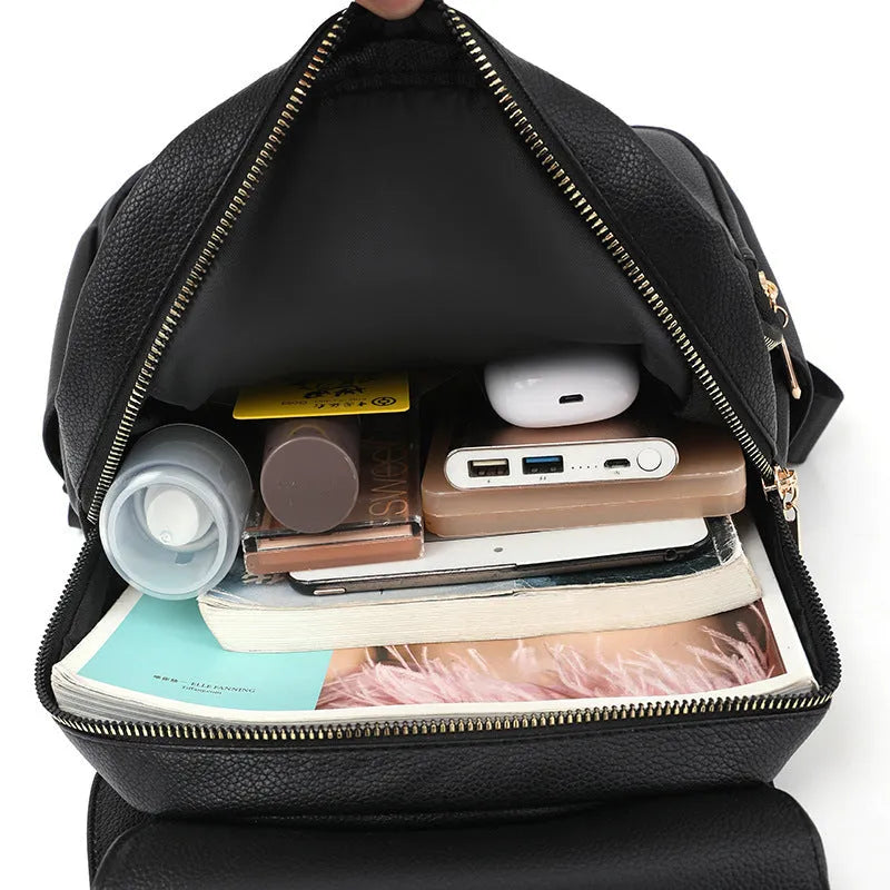 Women's casual PU leather backpack with three-dimensional pockets and line pattern details