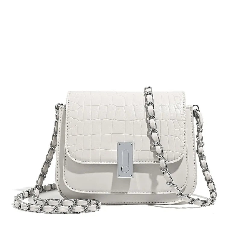 Women's black PU leather crossbody shoulder bag showing horizontal square shape and outer sandwich pocket