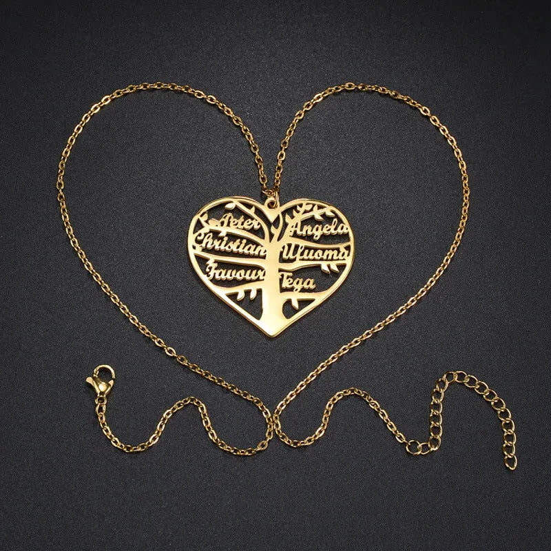 Custom engraved women's necklace with hollow heart and tree pendant on an adjustable chain.