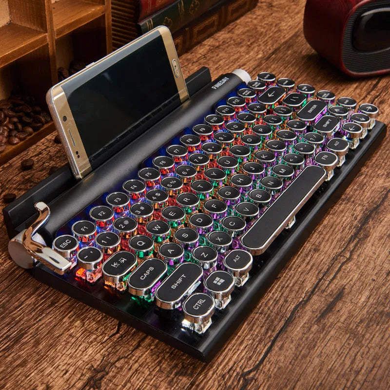 Black Dot retro mechanical keyboard with colourful backlit keys on a desk