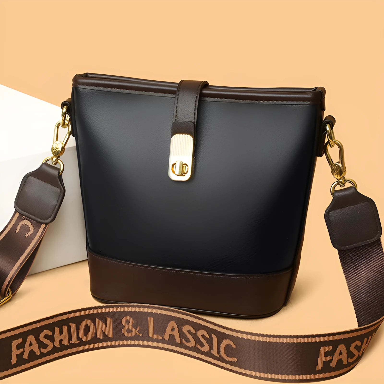 Korean style black bucket messenger bag with double shoulder straps and internal organisation pockets