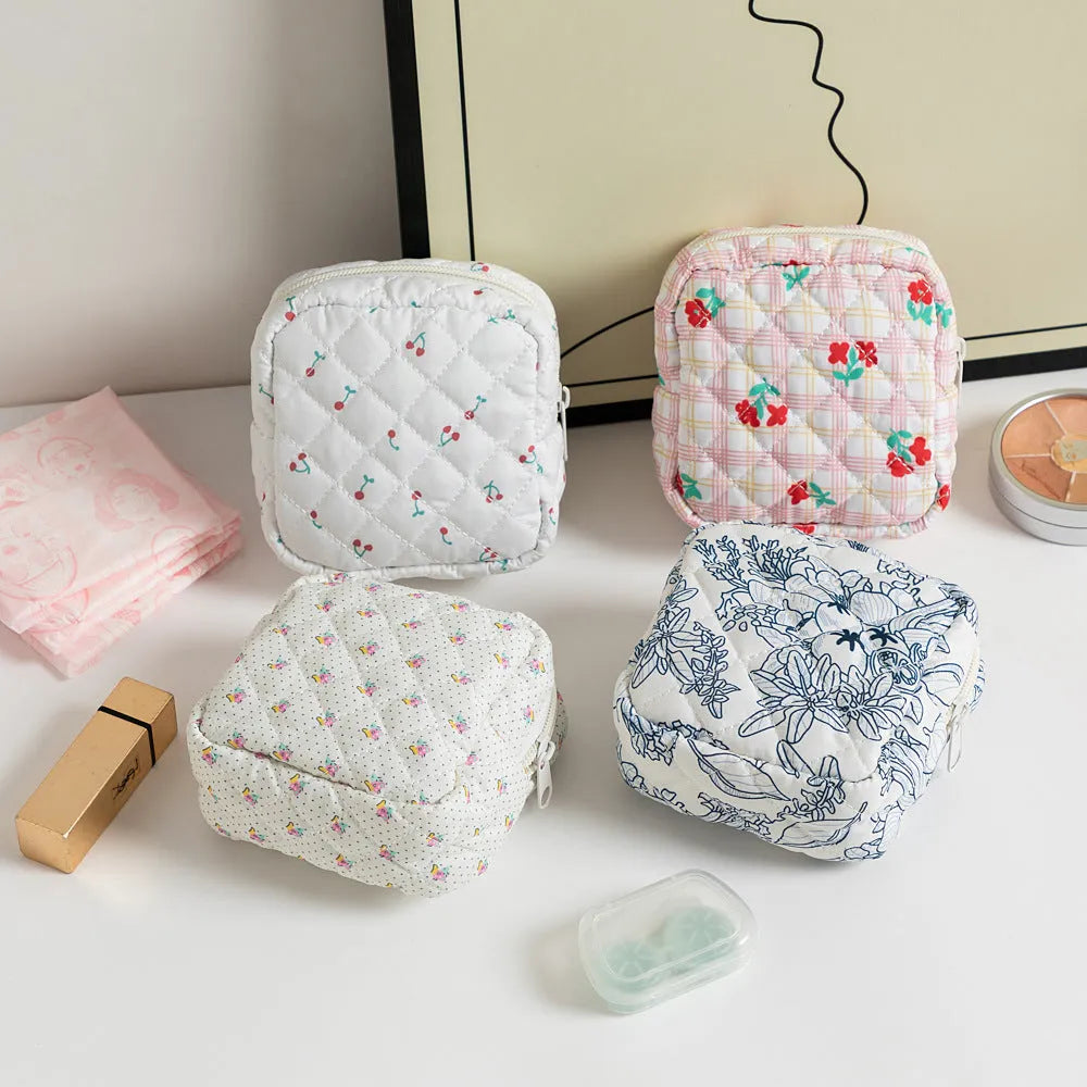 Polyester key storage bag with floral pattern and sewing thread detailing