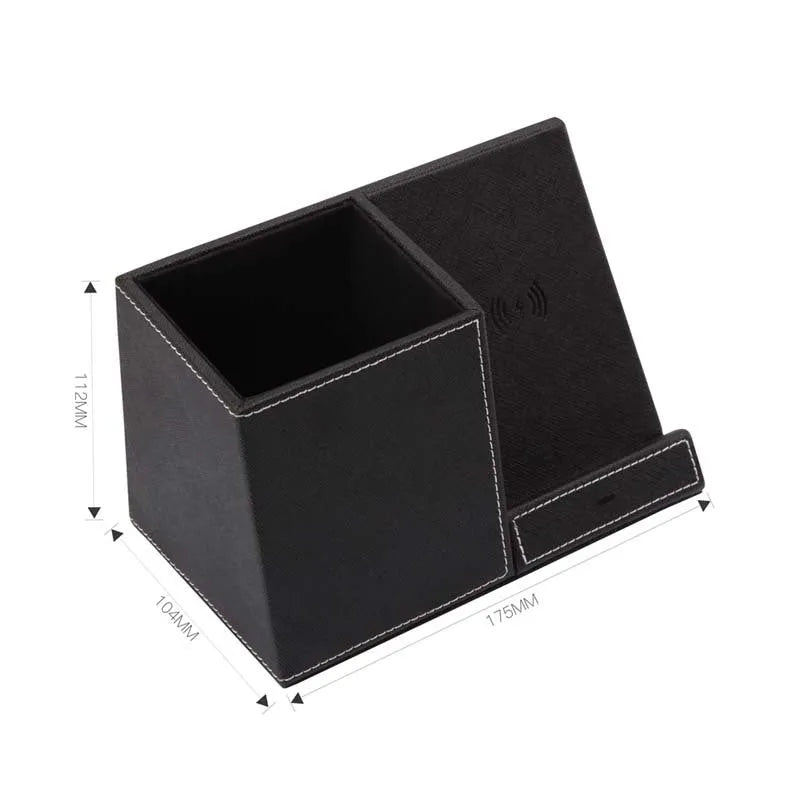 Black leather desk organiser with wireless phone charging surface and pen holder compartment