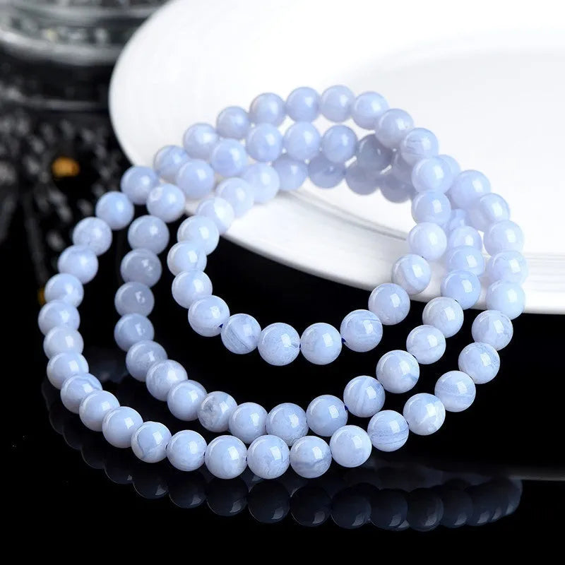 Blue agate bracelet with natural striped beads and scattered Ruyi charm elements