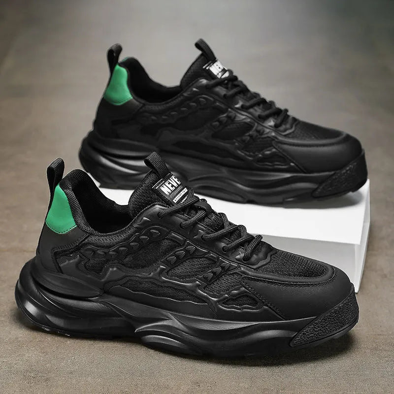 Men's solid colour casual shoes with breathable mesh upper in black or white.