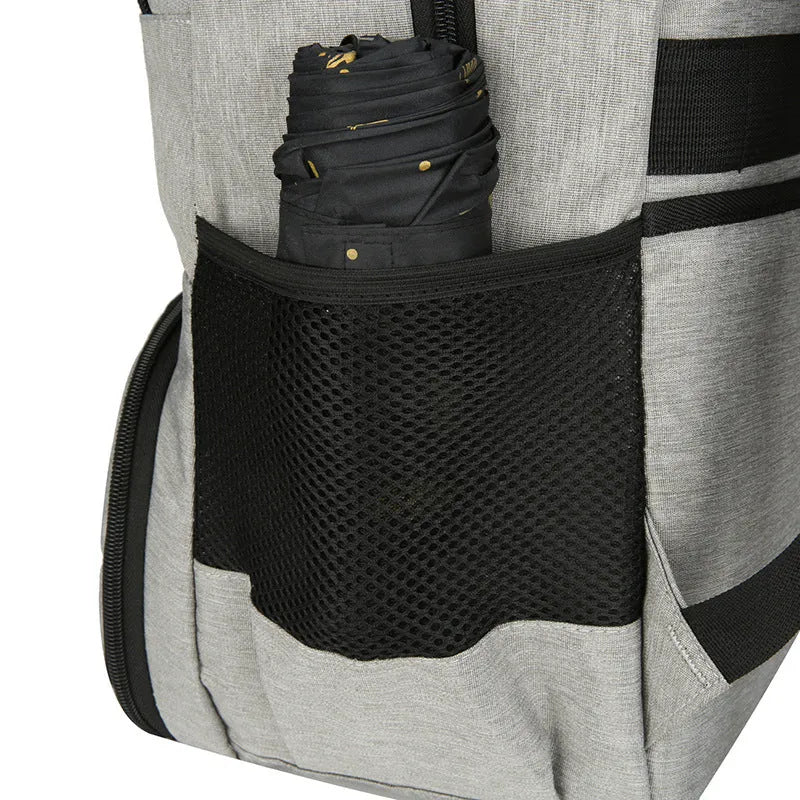 Light grey Oxford cloth insulated picnic backpack with curved shoulder straps showing dry-wet separation compartments