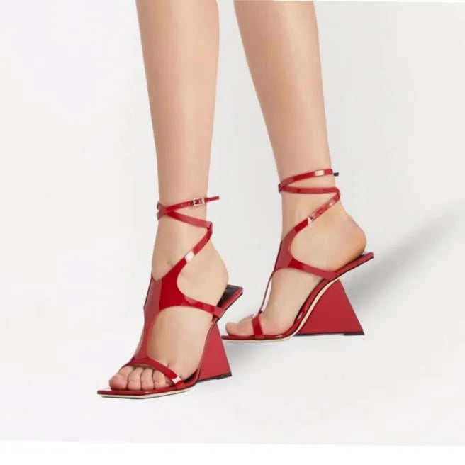 Women's black square toe high heel sandals with ankle strap and 9.5cm heel.