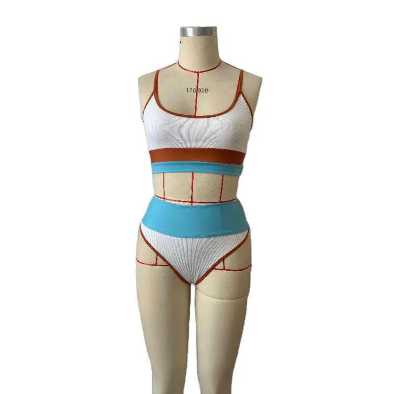 Women's solid colour quick-drying nylon bikini set with top and shorts.
