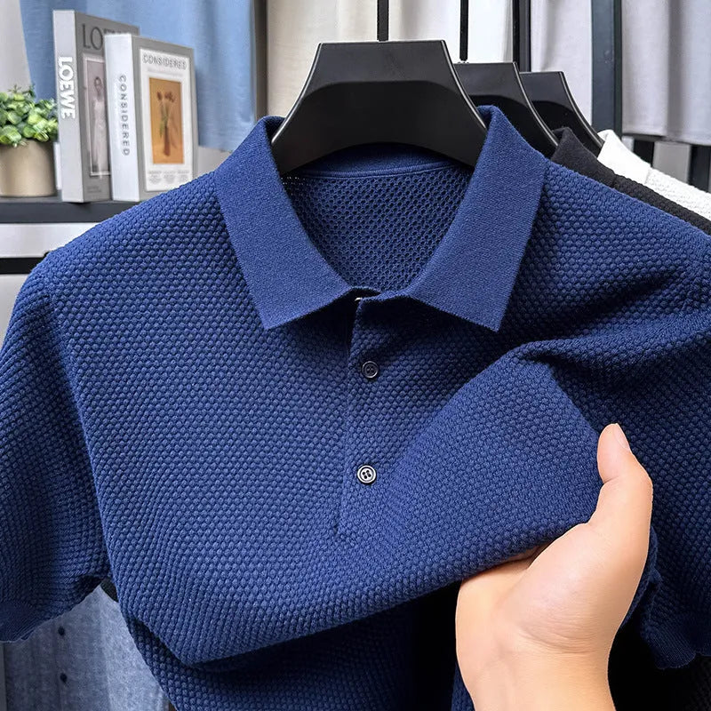 Loose fitting short sleeve cotton pullover sweater in a solid colour on a hanger