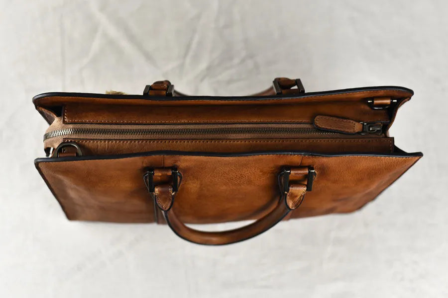 Men's brown leather horizontal business handbag with zipper closure