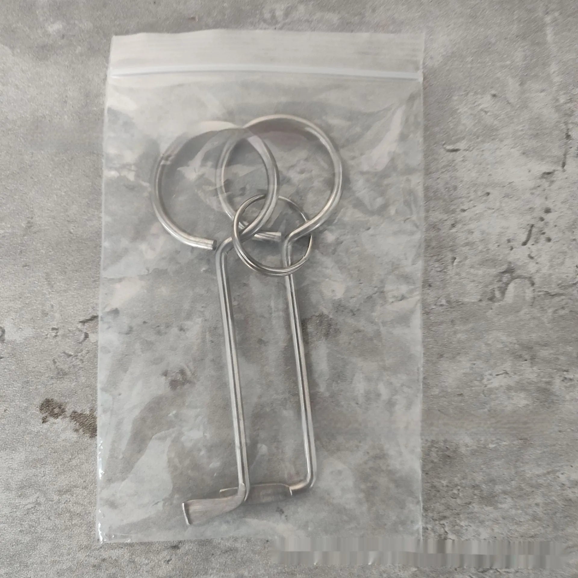 Two alloy wrench tools from portable universal maintenance set