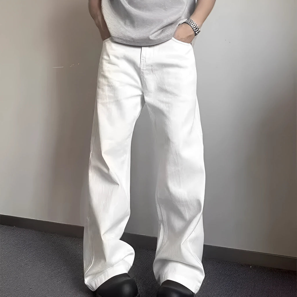 Men's white denim jeans with loose straight wide leg cut and mid waist