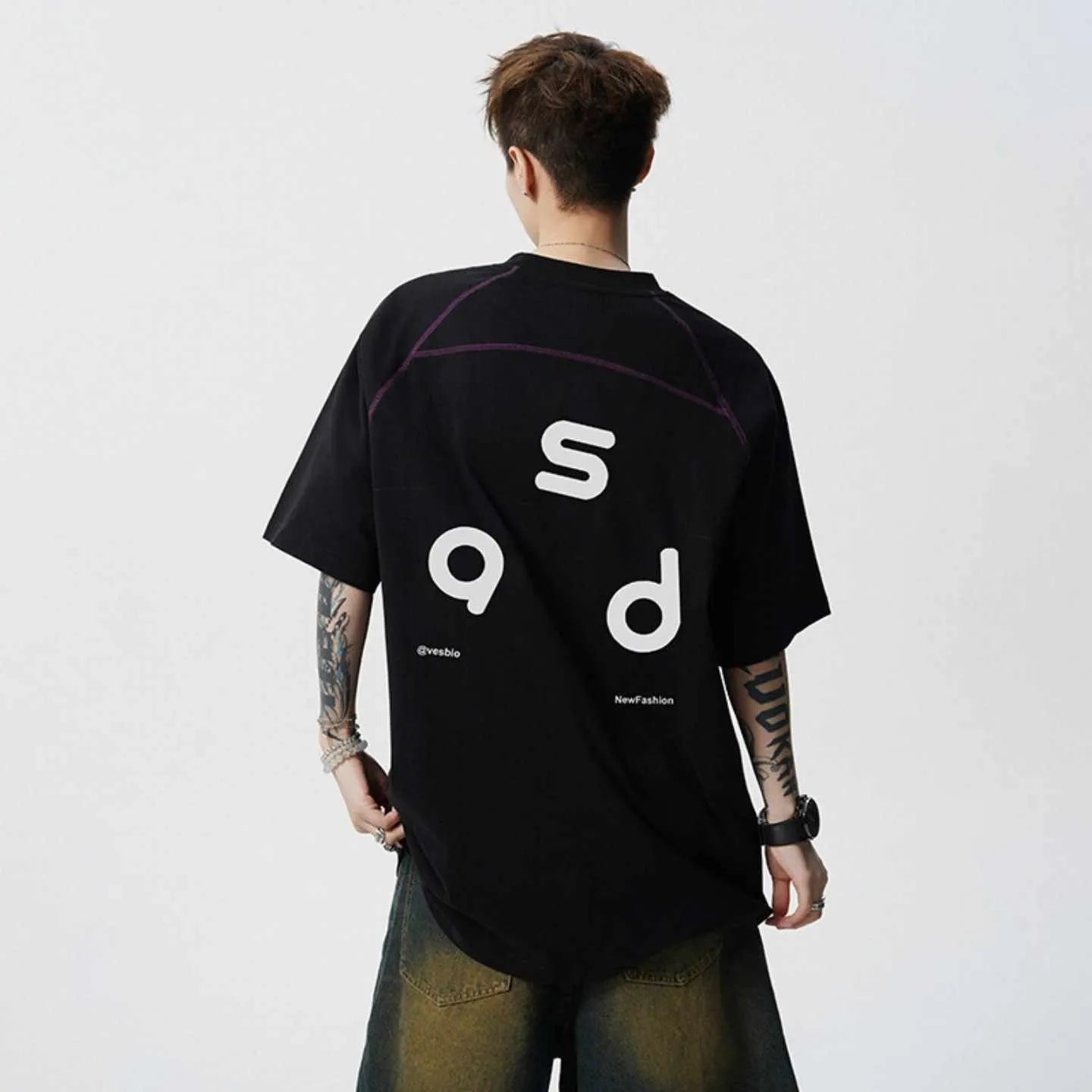 Cotton loose fit short-sleeve T-shirt with letter print on front, shown in black colour