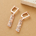 Rectangular hollow stud earrings with a two-tone picture style finish.