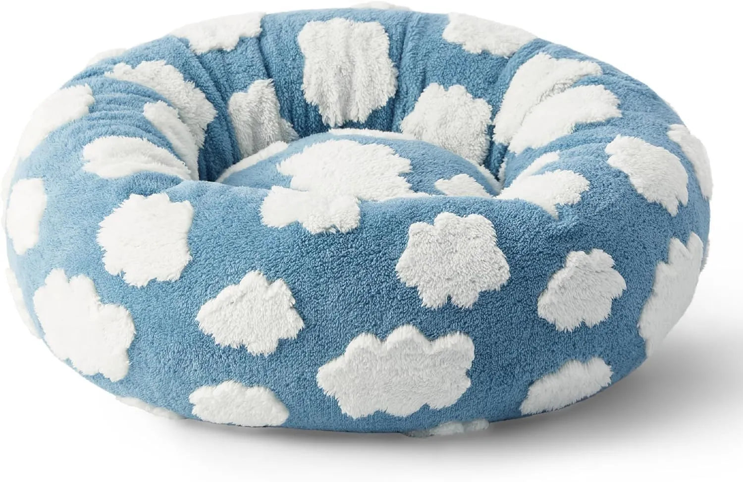 Round blue and white plaid dog bed with a removable cover on a plastic base