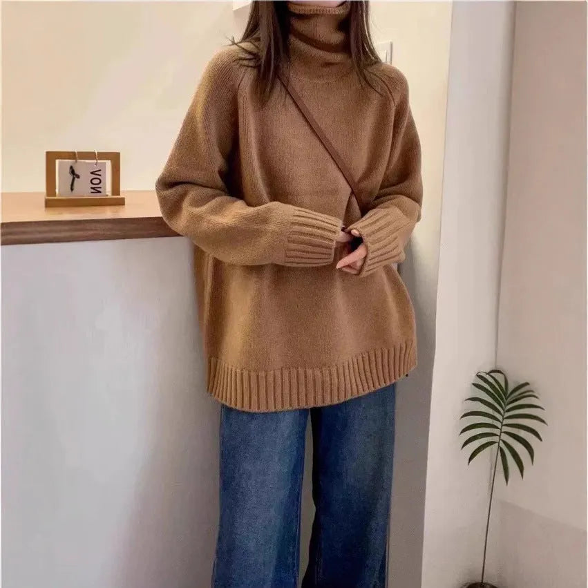 Women's loose turtleneck sweater with thick curling pile collar in solid colour