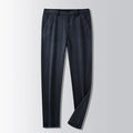 British retro striped straight-leg trousers in a chemical fibre blend, showing zip placket detail.