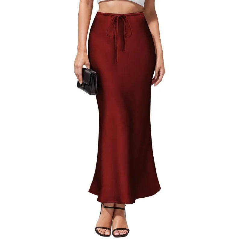 Acetate fabric asymmetric skirt with high waist and irregular stitching in solid colour