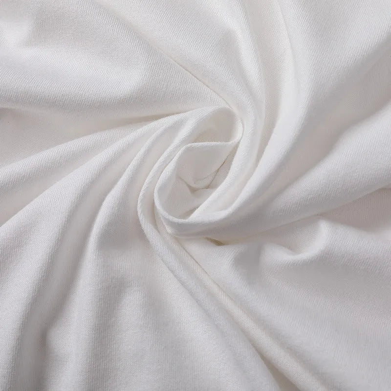 Men's plain cotton short sleeve t-shirt in apricot colour on a hanger.