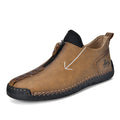 Men's black leather boots with front zipper and hand-stitched detailing, mid-calf height with low rubber sole